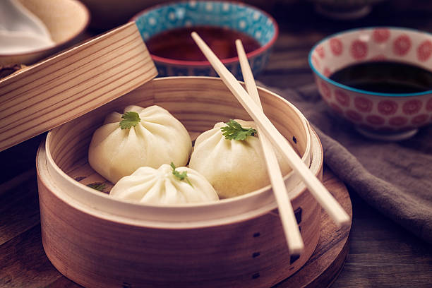 istock Dim Sum Dumplings Freshly Steamed in a Bamboo Steamer 480052548