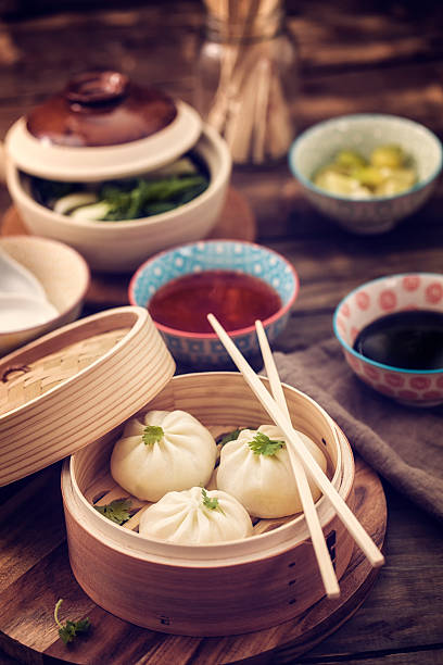 istock Dim Sum Dumplings Freshly Steamed in a Bamboo Steamer 480052554