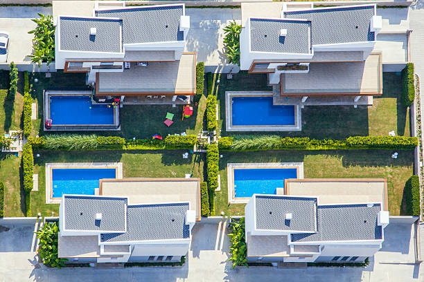 istock aerial view group of houses with pool 480053044