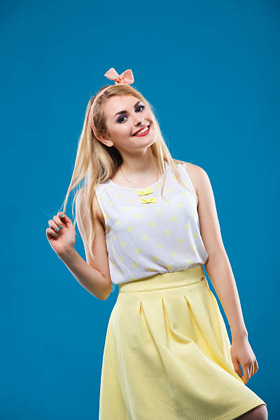 istock girl in the studio, pin-up, flirting, showing different emotions 480053166