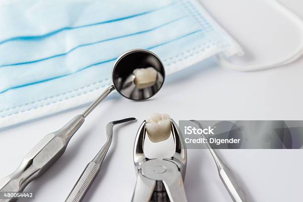 Tooth Extraction Concept Stock Photo - Download Image Now - Removing, Wisdom, Dental Equipment