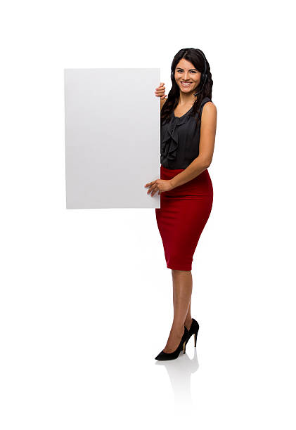 istock Smiling businesswoman showing placard 480057930