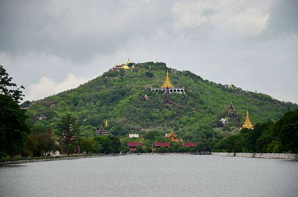 Mandalay Hill with moat at front of Mandalay Palace stock photo