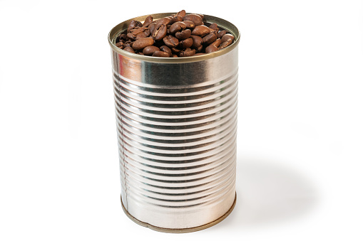 Nice roasted coffee beans in a small tin can