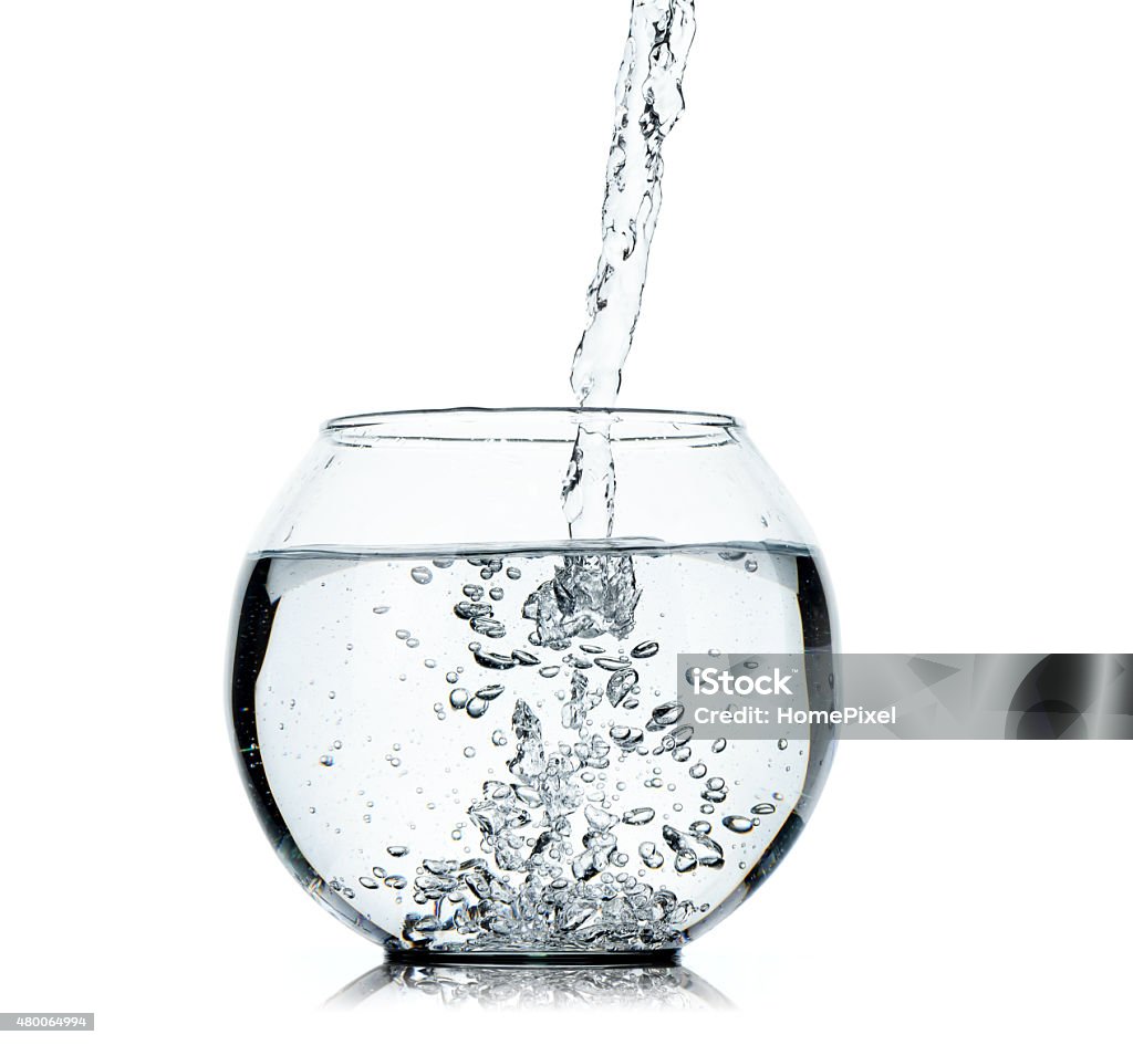 Water splashing from glass isolated on white background 2015 Stock Photo