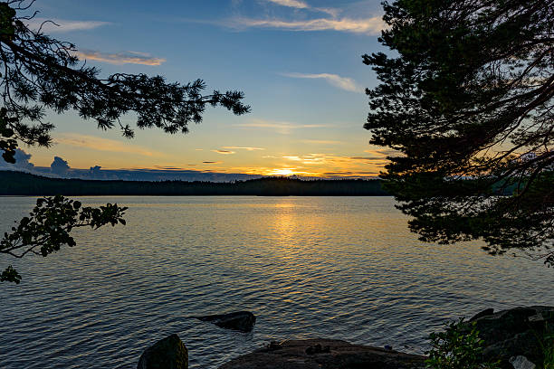 istock Sunset over a lake during summer in Sweden 480065044