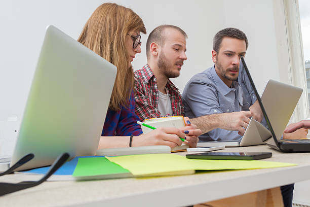 istock Young group of people discussing business plans 480065968