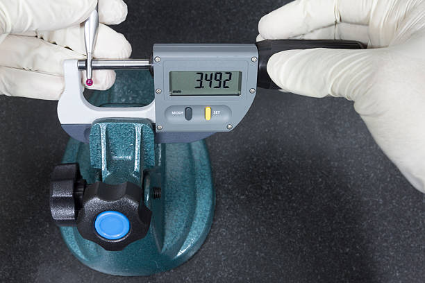 istock human use digital micrometer measurement a red ball probe 480067122
