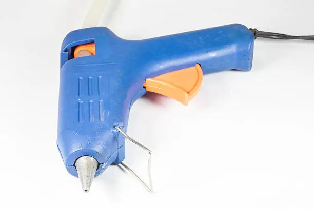 Hot Glue pistol  on white background.