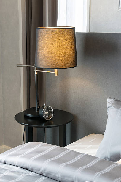 istock modern bedroom with pillows and lamp 480070446