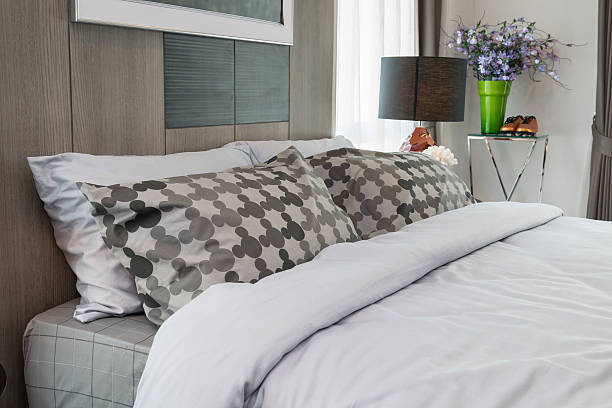 istock modern luxury bedroom with pillows and lamp 480072284