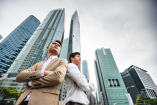 Asiatic Businessmen standing in Singapore