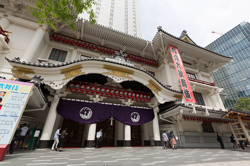 Tokyo, Japan - June 8, 2015 : Pedestrians walk past the Kabuki-Za Theater in Tokyo, Japan. This theater is located in Ginza, Tokyo, Japan. The reconstructed Kabuki-Za theater opened on March 2013. 