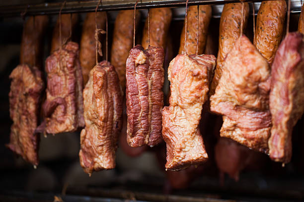 istock smokehouse - Smoked meats - ham, bacon 480076096