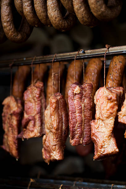 istock smokehouse - Smoked meats - ham, bacon 480076100