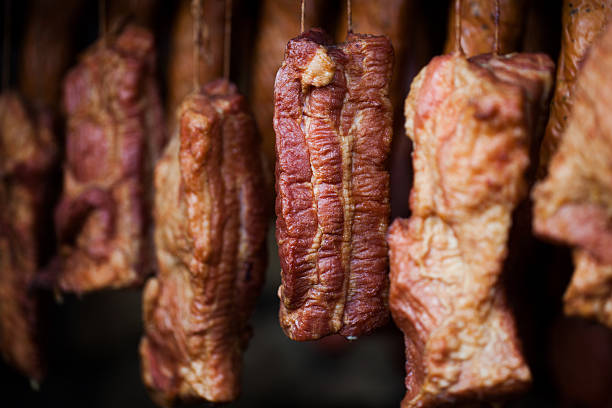istock smokehouse - Smoked meats - ham, bacon 480076318