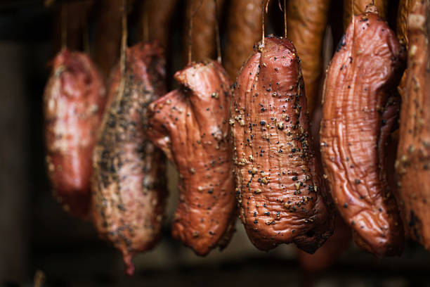 istock smokehouse - Smoked meats - ham, bacon 480076328