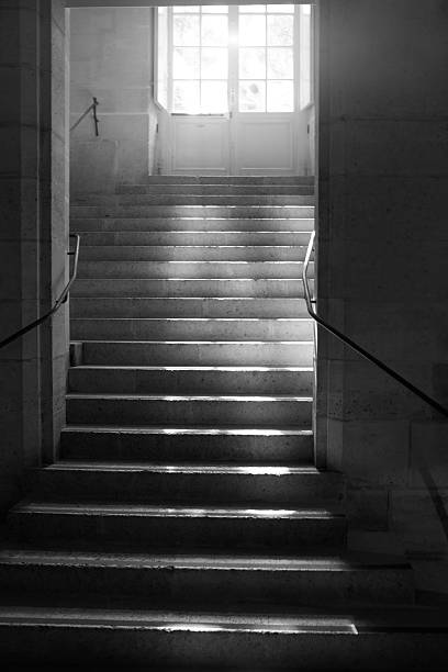 istock Old stone steps leading up a dark alleyway 480088370