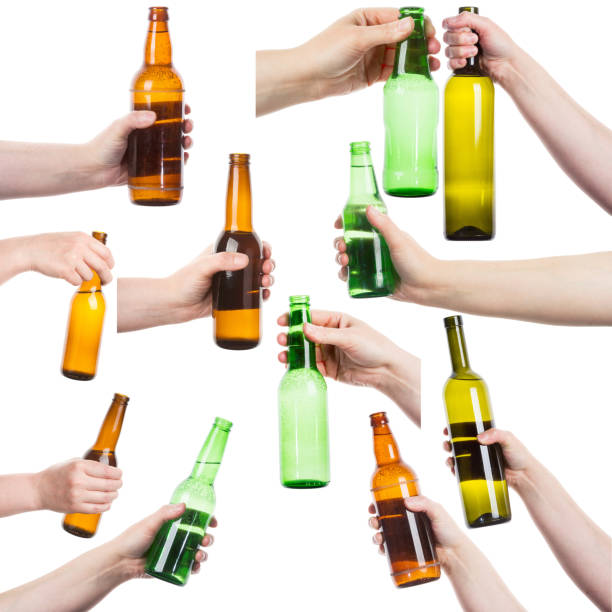 istock Collection of female hands holding alcohol bottles 480088476