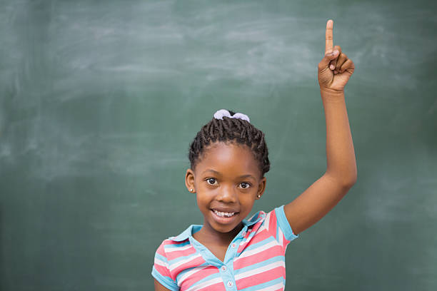 istock Pupils raising hand in classroom 480089050