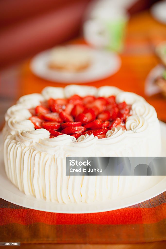 Delicious strawberry cake with strawberries Delicious strawberry cake with strawberries and whipped cream 2015 Stock Photo