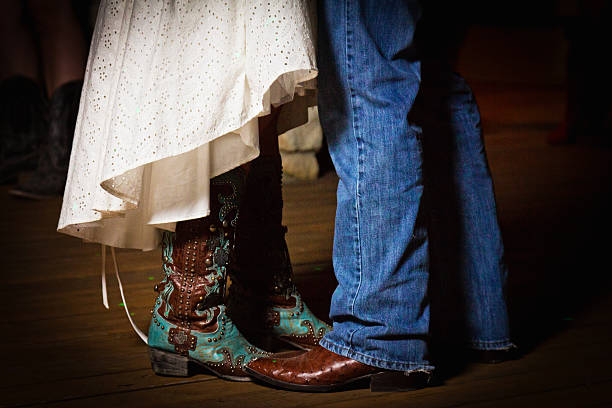 Bride and Groom Dancing Boots stock photo