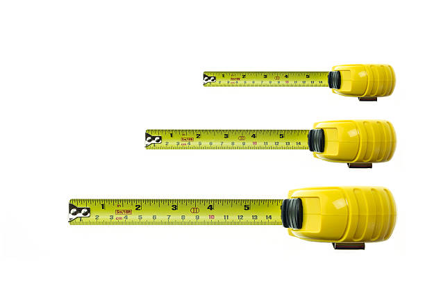 istock Close up new yellow measuring tape isolated on white 480097666