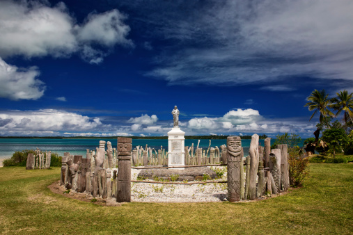 A memorial to European Missionaries on Isle Of Pines, with carved totems