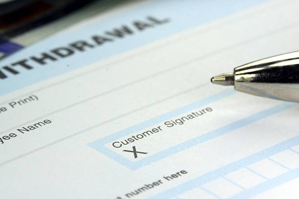 istock Withdrawal slip from bank checking or savings account 480104689