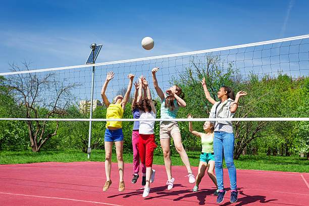 istock Teenagers team actively playing volleyball game 480106278
