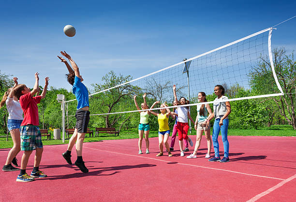 istock Jumping boy during volleyball game on the court 480106482