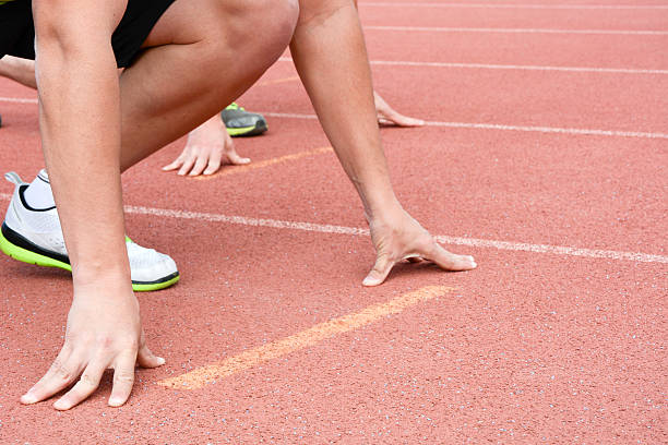 istock Runners at the start of the track 480106876