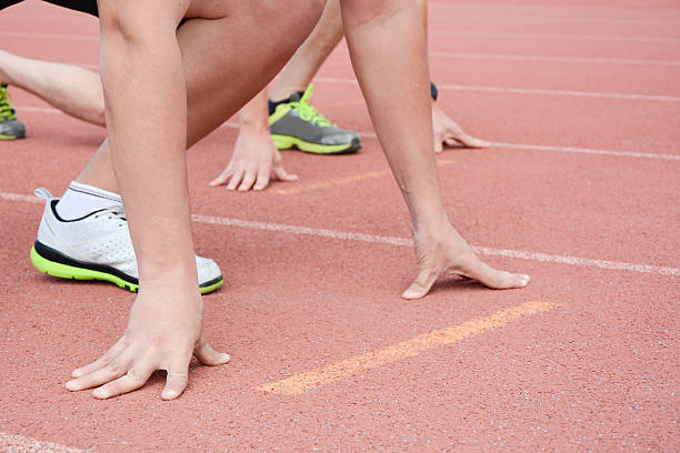 istock Runners at the start of the track 480106904