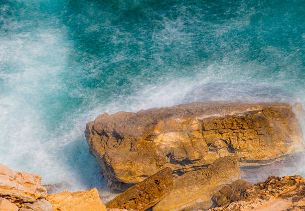 Rocky coastline with multiple exposure effect.
