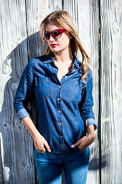 istock Pretty woman with hands in pocket 480111038