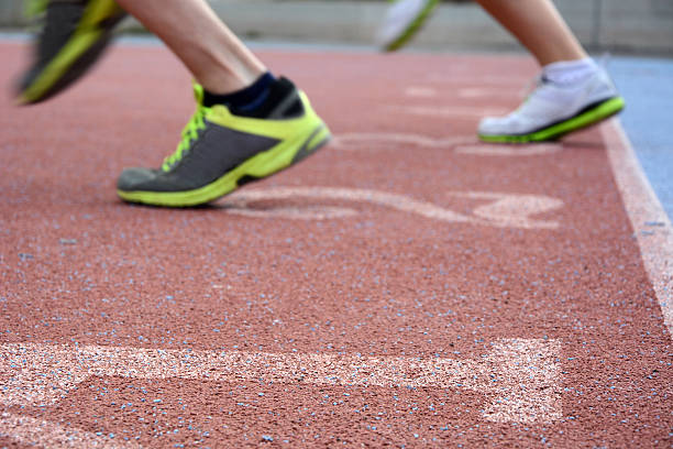 istock Runners at the start of the track 480112144