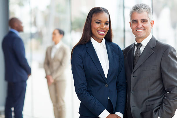 istock corporate colleagues in office 480112617