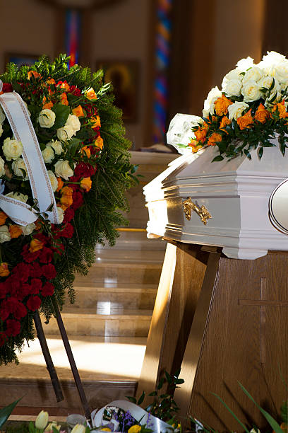 istock White Coffin, wreaths in the Catholic Church 480113105
