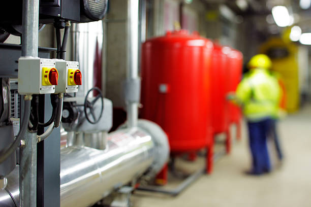 Mechanical and electrical plant rooms Mechanical and electrical plant rooms are are a highly sophisticated centers for efficiently controlling heating and cooling of modern buildings air valve stock pictures, royalty-free photos & images
