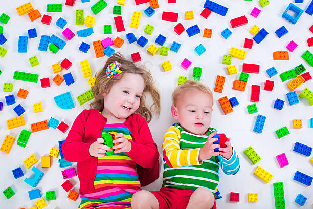istock Little kids playing with colorful blocks 480118638