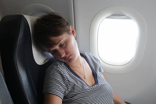 istock Woman at airplane 480119118