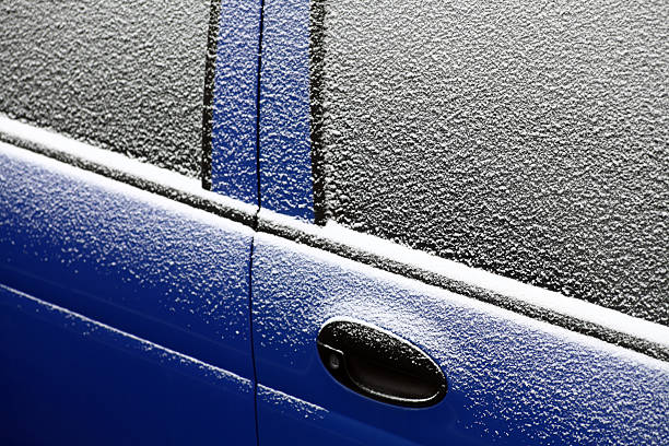 istock Snowy car door 480120783