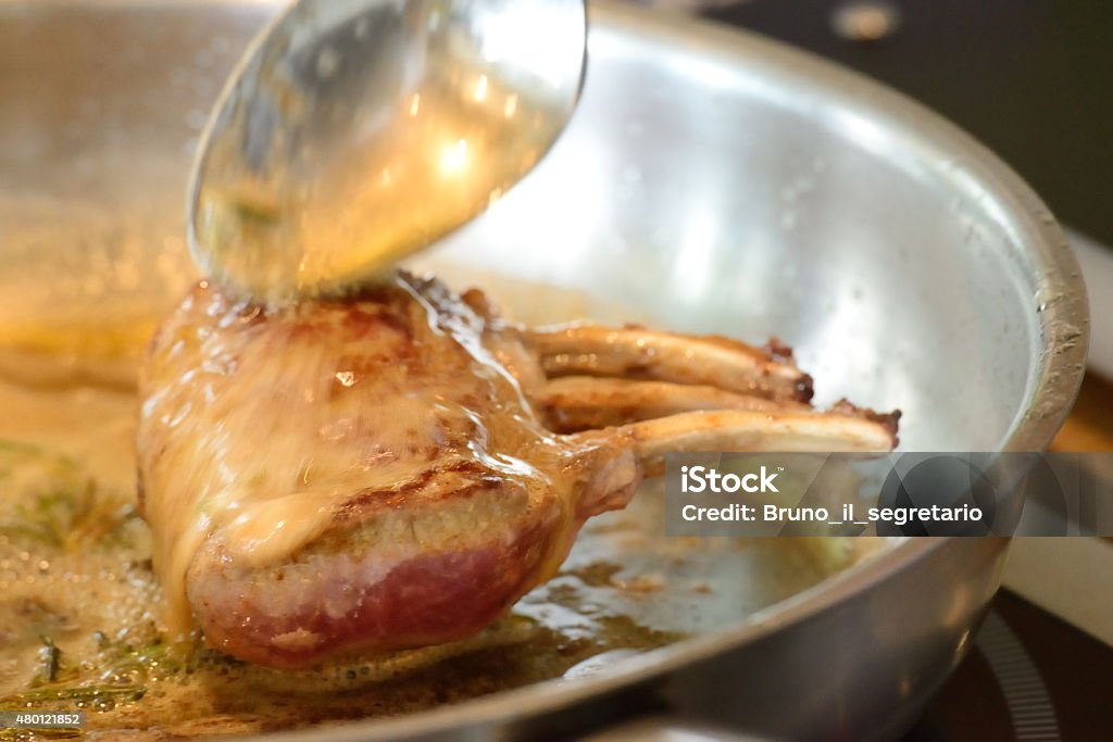 Lamb in progress Slow food Lamb chop, Gourmet, Cooking, Eating 2015 Stock Photo