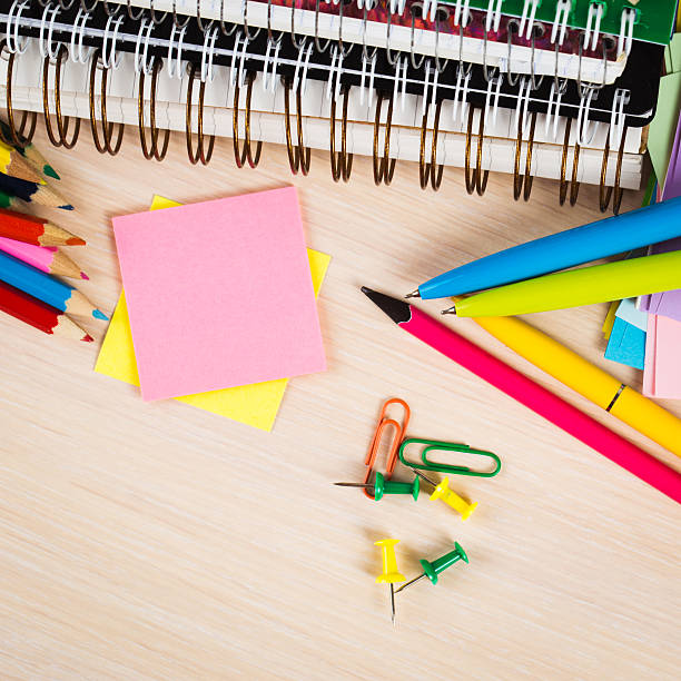 istock School and office accessories on wooden background 480121970