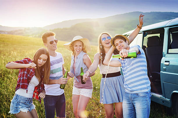 istock Young hipster friends on road trip 480122796