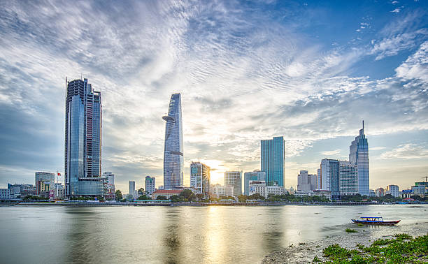 Sunset - Summer - HCM City This image is took around 5:30pm in the summer in Ho Chi Minh City.  ho chi minh city photos stock pictures, royalty-free photos & images