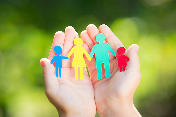 istock Paper family in hands 480126943