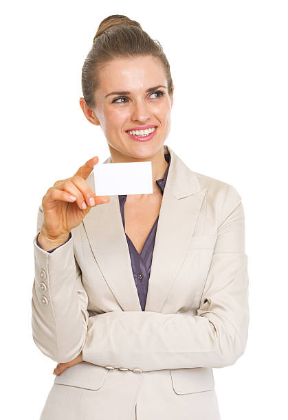 istock Thoughtful woman holding business card 480128267