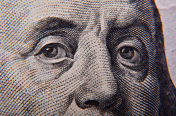 istock Benjamin Franklin's face on the one hundred dollars 480129611