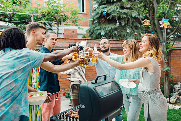 istock Happy Young People Toasting At Barbecue Party. 480131572